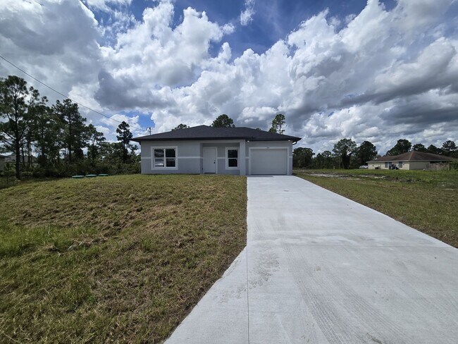 Building Photo - Brand New 2/2/1-South Lehigh Acres
