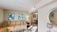 Located at 55 Gettysburg Square Rd in Fort Thomas, Kentucky, this single-floor residence offers a comfortable and thoughtfully designed layout. The living room serves as the heart of the home, featuring plush carpeting, a textured ceiling, and a sliding glass door that invites abundant natural light and provides access to an outdoor patio area. The space flows naturally into a dedicated dining area, which is accented by a ceiling fan and warm-toned walls, creating an inviting atmosphere for everyday meals.

The kitchen is efficiently laid out with rich dark cabinetry, light countertops, wood-look flooring, and track lighting overhead. It includes a double sink, dishwasher, and stainless steel refrigerator, with ample storage throughout.

Two bedrooms offer restful retreats, each featuring soft carpeting, neutral walls with accent colors, and windows with blinds that allow for natural light. Both rooms include closet storage, with one bedroom featuring a sliding-door closet. The full bathroom is clean and functional, complete with a shower-tub combination, vanity with dark cabinetry, and wood-look flooring.

Throughout the residence, a cohesive neutral palette with soft accent tones contributes to a calm, livable ambiance well-suited for comfortable everyday living.
