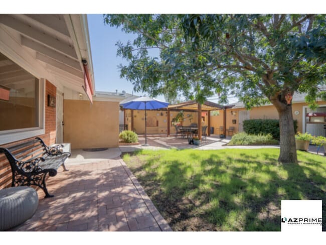 Building Photo - Welcome to your Elegantly Furnished 4/3 Ha...