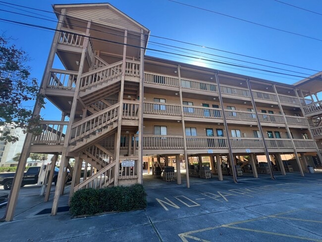 Building Photo - Walk to the Beach! Two-bedroom condo in Myrtle Beach. Adjacent to Beach Access!