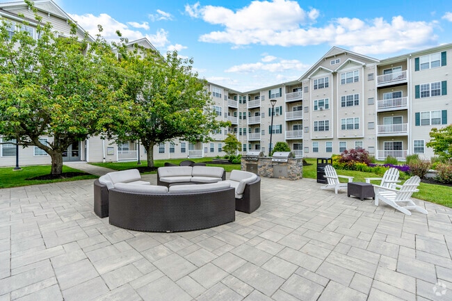 Outdoor Fire-pit and Grill Area - Highlands at Faxon Woods
