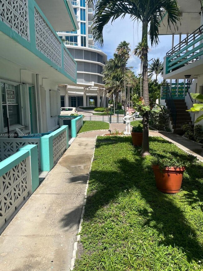 Building Photo - 6498 Collins Ave