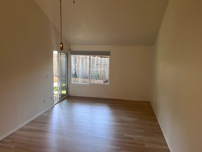 Building Photo - Two Bedroom Duplex Unit-Garage and nice fenced patio and side yard too