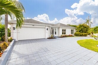 Building Photo - 4902 N Travelers Palm Ln
