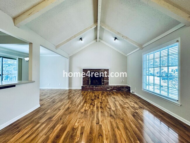 Building Photo - A Lovely Four Bedroom Home in Lenexa w/ Wood Floors, Finished Basement and a Fenced Yard!