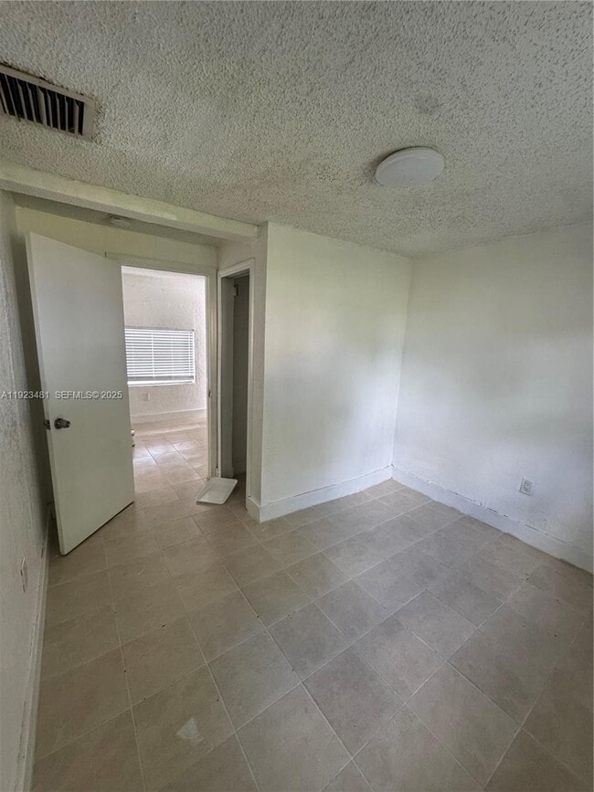 Building Photo - 6027 NW 22nd Ave