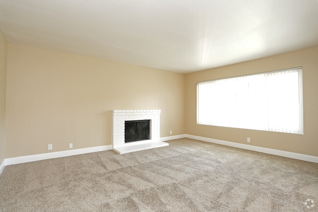 Dolores Floor Plan Living Area with Fireplace - Mission Heights Apartments