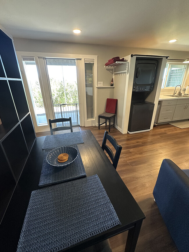 Dining table seats four. - 7079 Engineers Rd