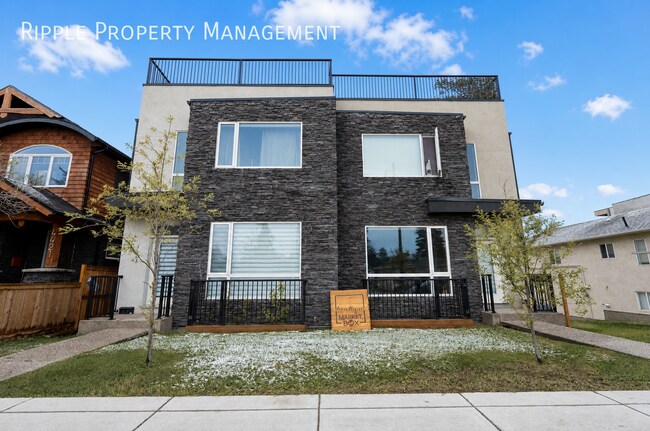 Photo du bâtiment - MODERN & SPACIOUS 3 BEDS, 3.5 BATHS TOWNHOUSE | EXCLUSIVE ROOF-TOP PATIO