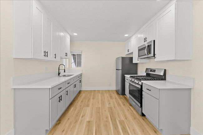 Building Photo - Beautifully Renovated Two Bedroom Apartment!