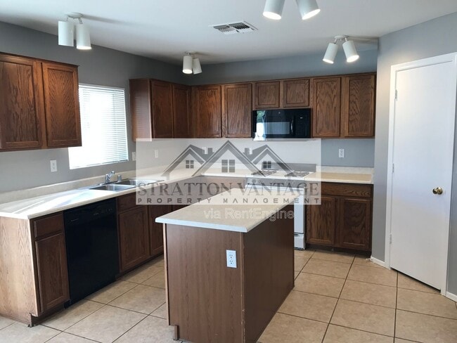 Foto del edificio - 12525 W Rosewood Ln