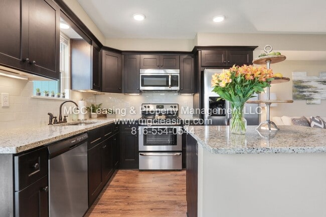 Building Photo - Serrano Townhomes  with walk out finished ...