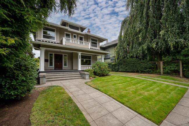 Building Photo - Traditional Four-Corner Craftsman Home on ...