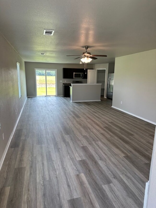 Building Photo - *Pre-leasing* NEWER Four Bedroom | Two Bat...