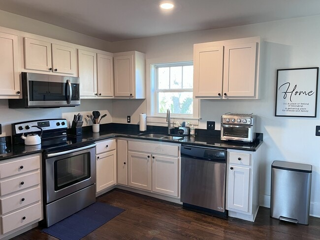 Kitchen with stainless steel appliances - 1115 N 2nd St House