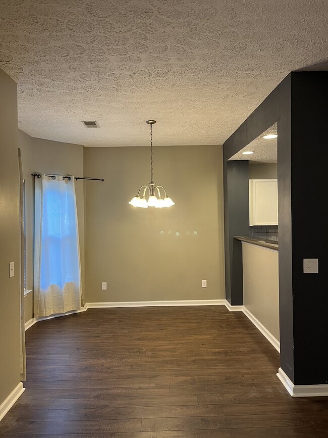 Building Photo - "Spacious 3-Bedroom Townhouse Retreat with Fireplace & Hardwood Floors in Antioch!"