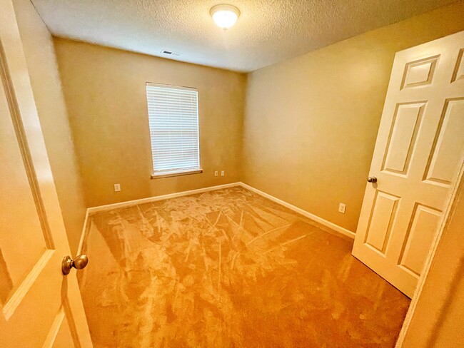 One of the 4 bedrooms - 102 Wallhaven Dr SW