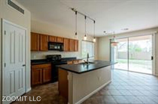 Building Photo - 5 br, 2.5 bath House - 7265 West Gardenia ...
