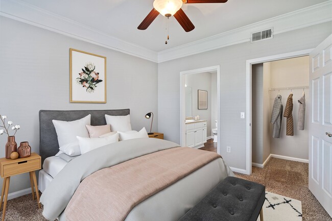 Bedroom with Large Closet and Ensuite Bathroom - Carrington Place Apartments