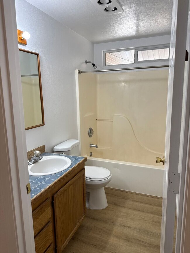 Building Photo - SE Home on Large Lot, New Luxury Vinyl Flooring & Paint, RV parking, Air Conditioning & Fenced