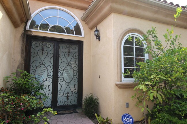 main entry behind gates - 2121 Mt Olympus Dr