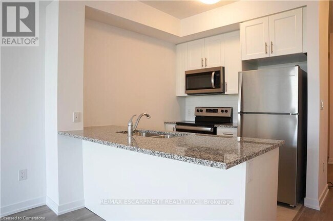 Photo du bâtiment - 450-450 Dundas St E