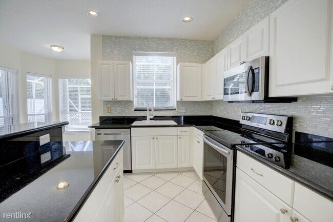 Foto del edificio - 4 br, 2.5 bath House - 7715 Colony Lake Dr