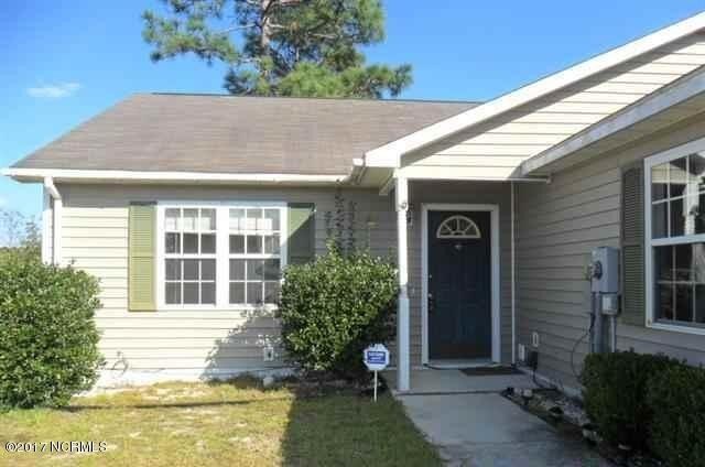 Building Photo - "Cozy Coastal Living: Charming 2-Bed, 2-Ba...