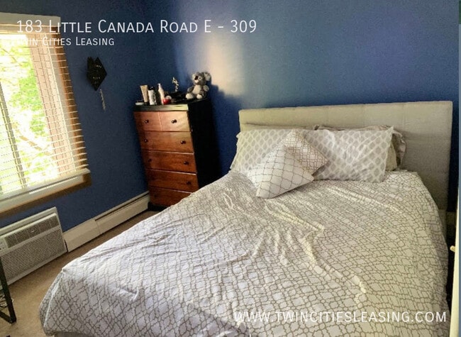 Building Photo - Amenities include a pool, sauna, garage pa...