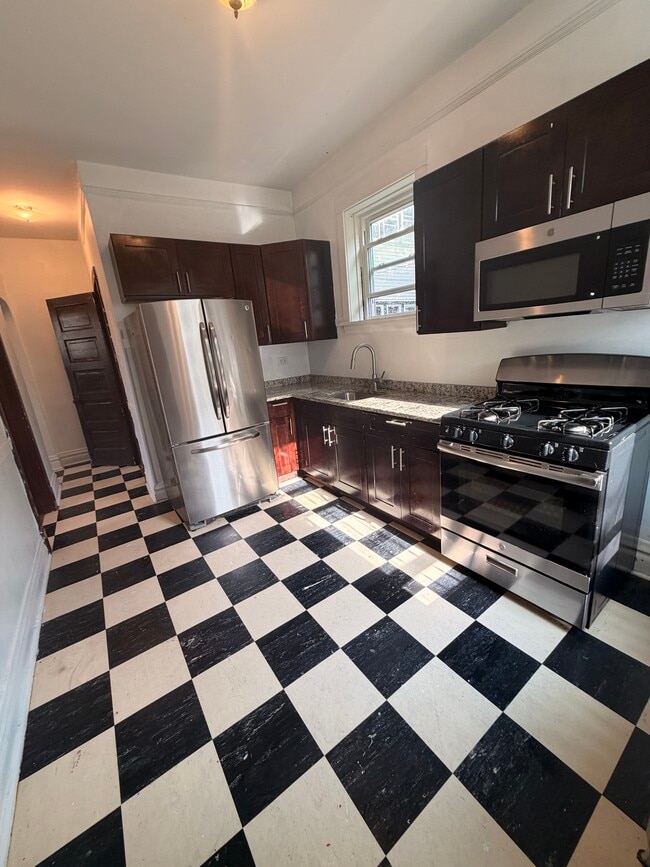 This is a different unit in the building, but look will be similar - 2256 Lawndale Ave