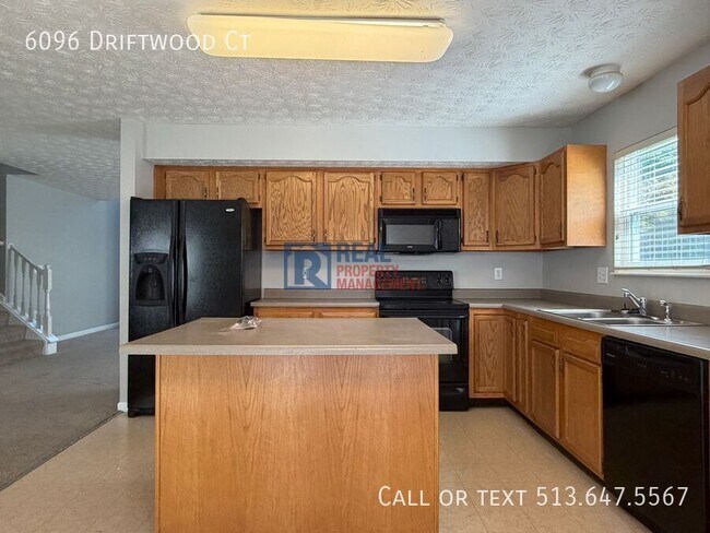 Building Photo - 6096 Driftwood Ct