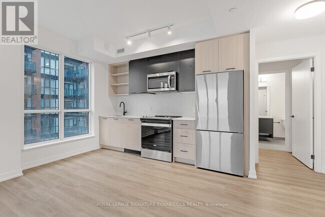Building Photo - 2300-2300 St Clair Ave W