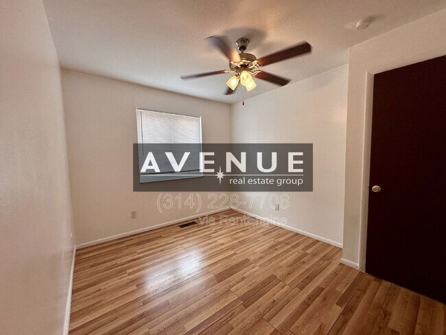 Foto del edificio - 10065 Puttington Dr