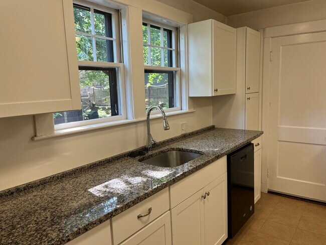 Kitchen with granite countertops, DW, disposal - 72 Madison Ave