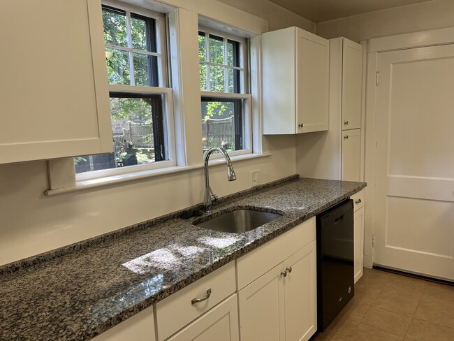 Kitchen with granite countertops, DW, disposal - 72 Madison Ave
