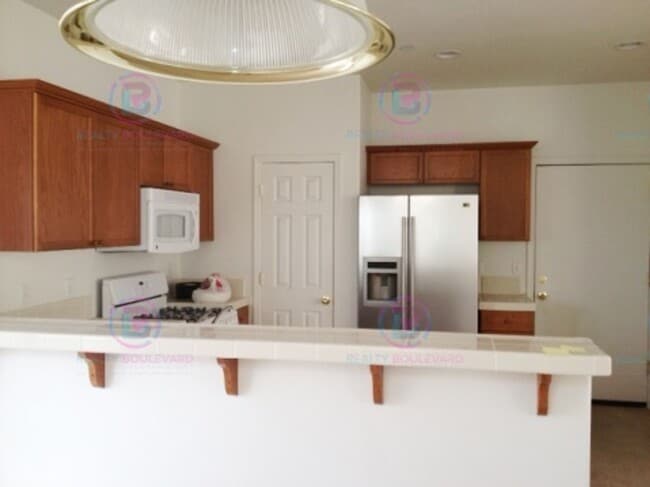 Building Photo - Stunning 2-Story Home with Scenic Views in...
