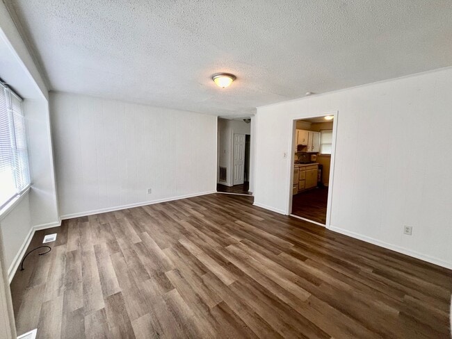 Building Photo - Lawn Care Included in Jville City Limits!