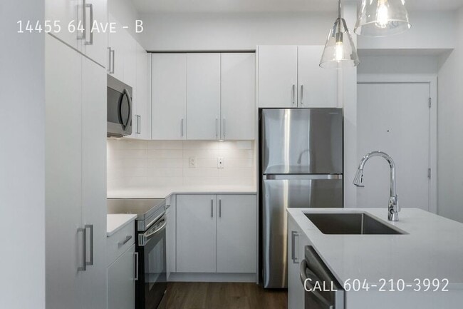 Photo du bâtiment - Brand New Condo in Sterling at Bell Centre - First Month Free!