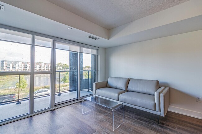 Building Photo - One Plus Den Furnished unit