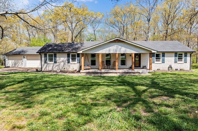 Spacious 4BR 3 bath 1300sq ft garage on 1 acre corner lot in desirable area. - 358 Twin Oaks Dr