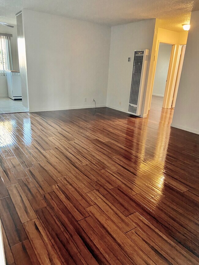 Refinished flooring (living room/entrance way) - 676 Garland Ave