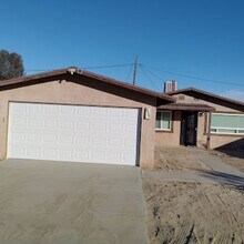 Building Photo - 6685 Desert Queen Ave