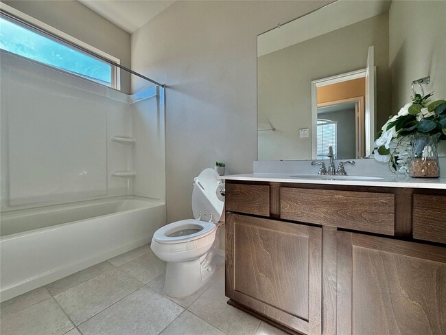 Building Photo - 8711 Windsong Trail Dr