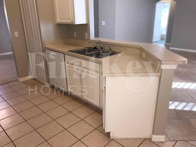 Foto del edificio - 1550 Golfside Village Blvd