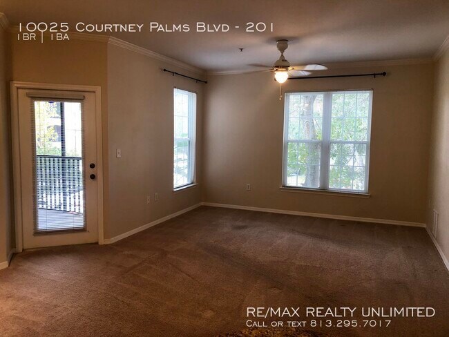 Building Photo - 10025 Courtney Palms Blvd #201 Tampa, FL 3...