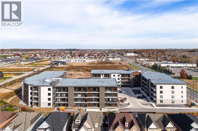 Building Photo - 7549B KALAR Road Unit# 405