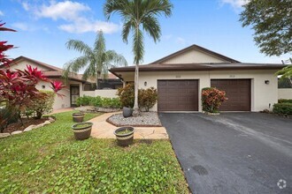 Building Photo - 6060 NW 92nd Ave