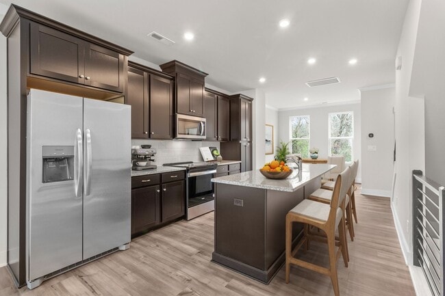 Building Photo - Charming Brand New 3BR Townhome in Uptown ...