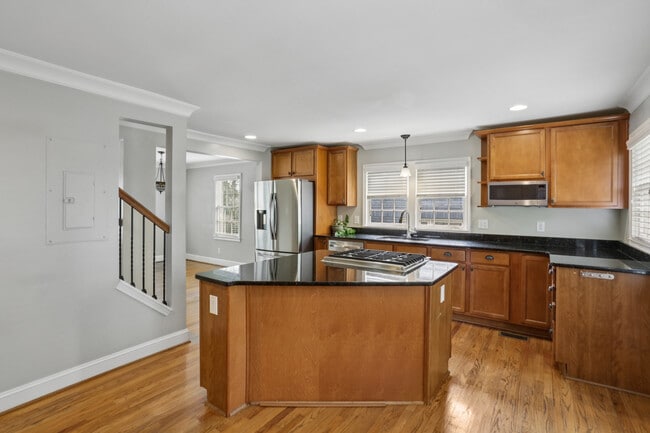 View of kitchen, flows into the dining room and living room - 781 Rosedale Ave SE