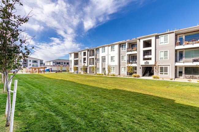 Building Photo - Stunning New 3-Bedroom Condo Near DIA, Major Employers & Top Commuter Routes